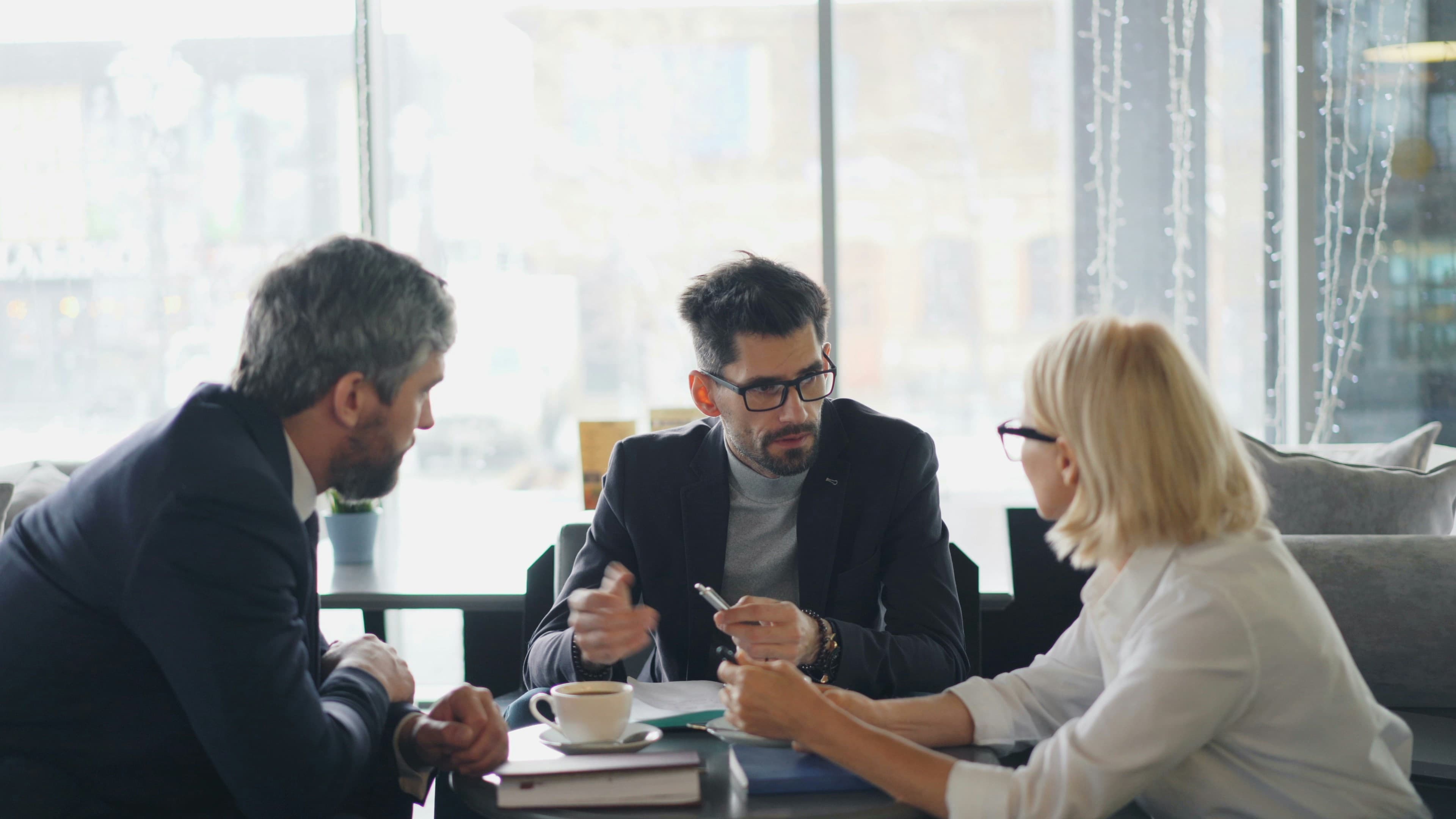 Real estate professionals consulting with a client