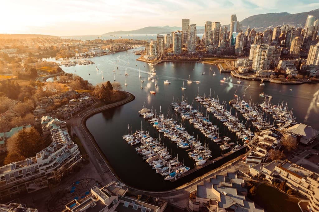 Aerial view of False Creek, the marina, and downtown Vancouver at sunset