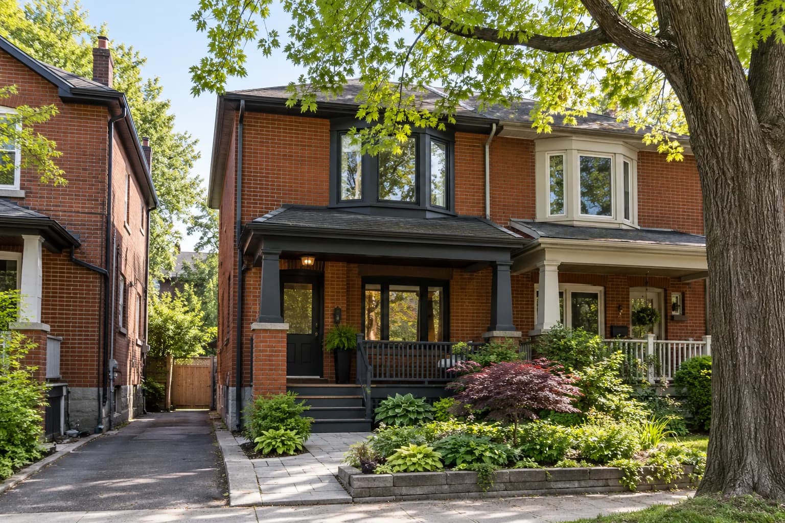 Red-brick semi-detached home with a tidy front garden and shaded porch in spring