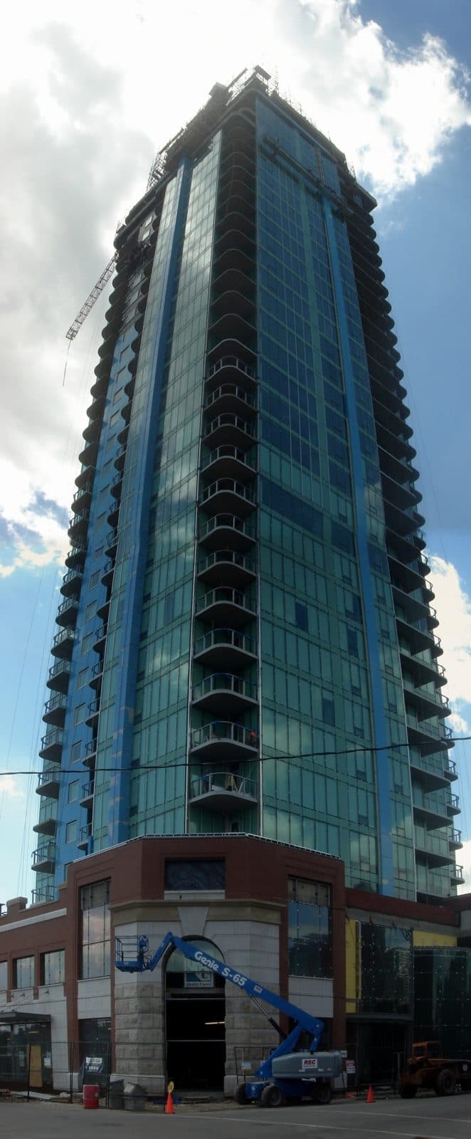 Arriva tower nearing completion with scaffolding lifts at its base