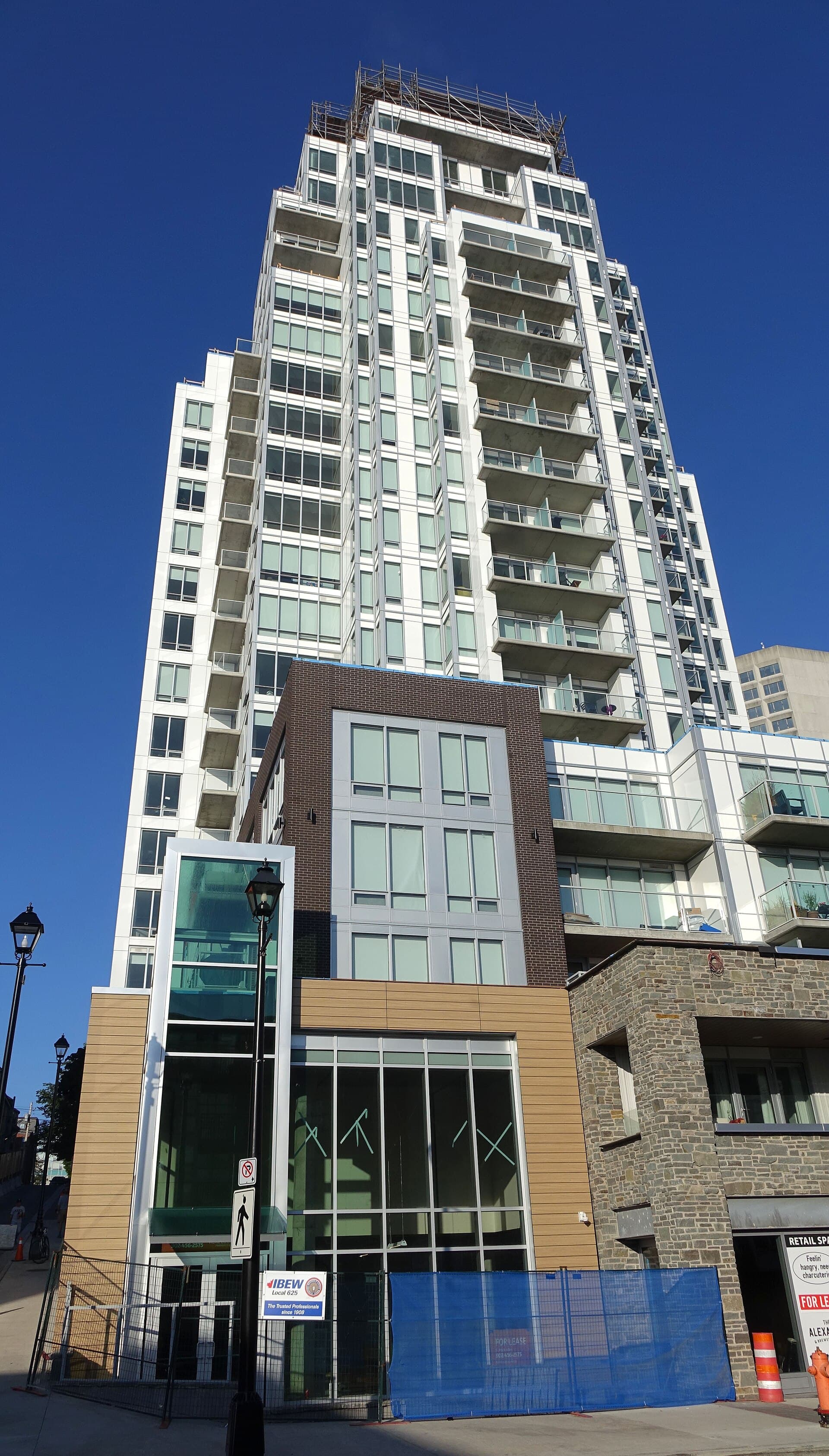 The Alexander tower in downtown Halifax with scaffolding still on the top floors