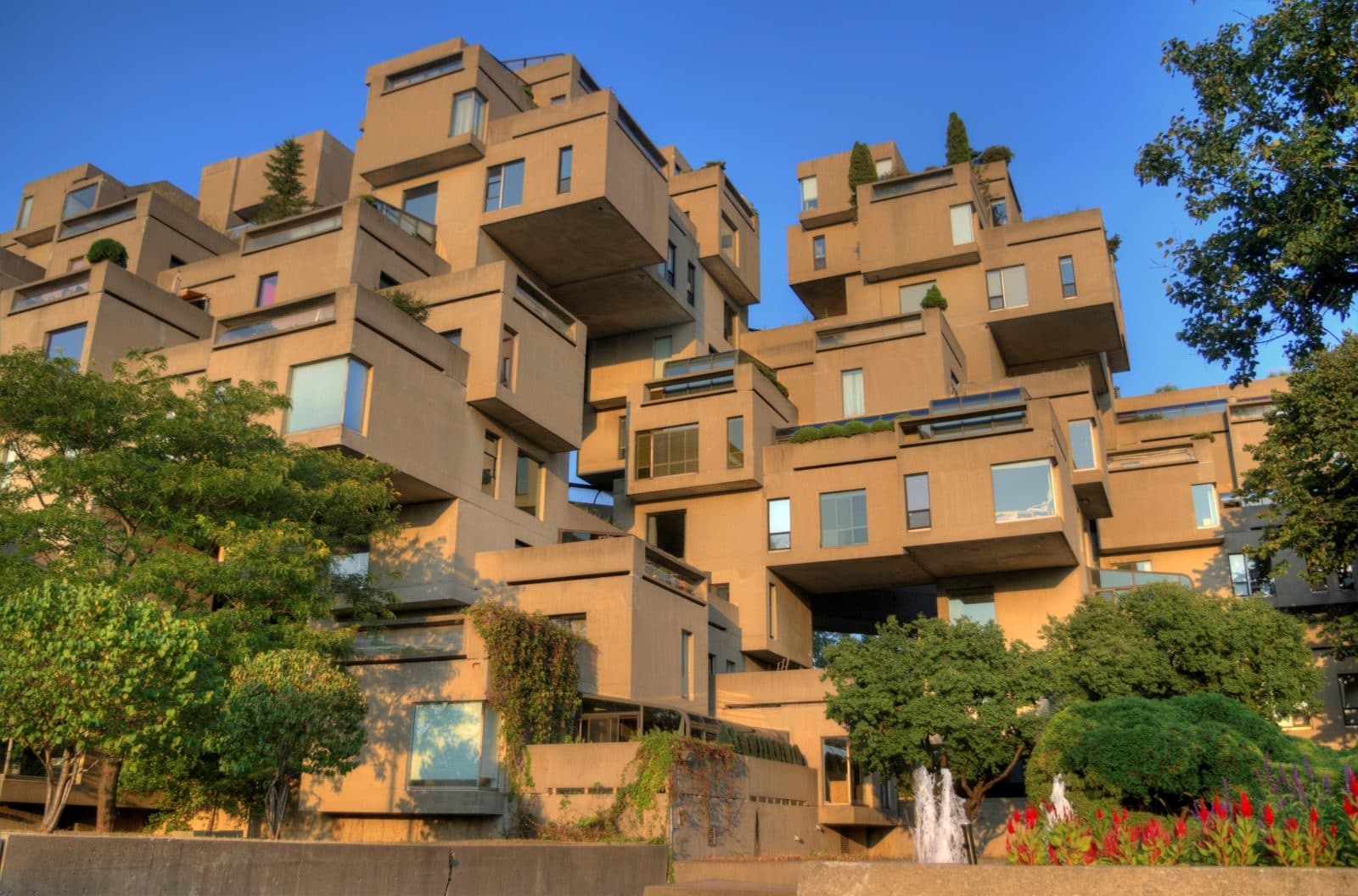 Habitat 67's stacked concrete modules with terraces and gardens