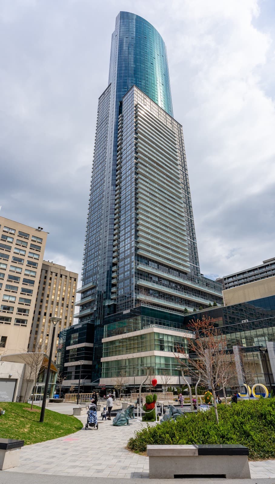 Aura condominium tower rising above Yonge Street in downtown Toronto