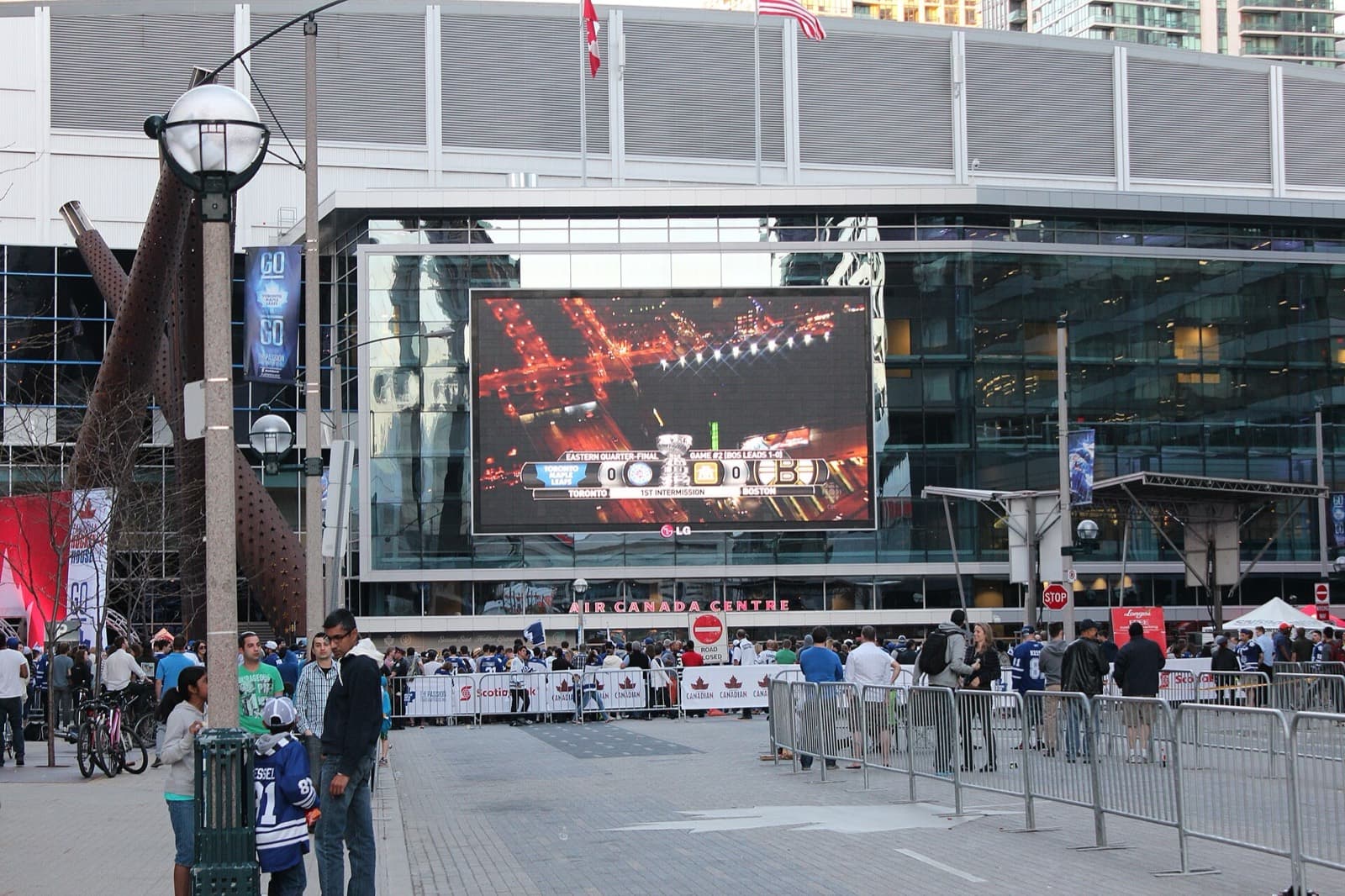 Hockey fans gathered in Maple Leaf Square in front of the arena during a playoff game