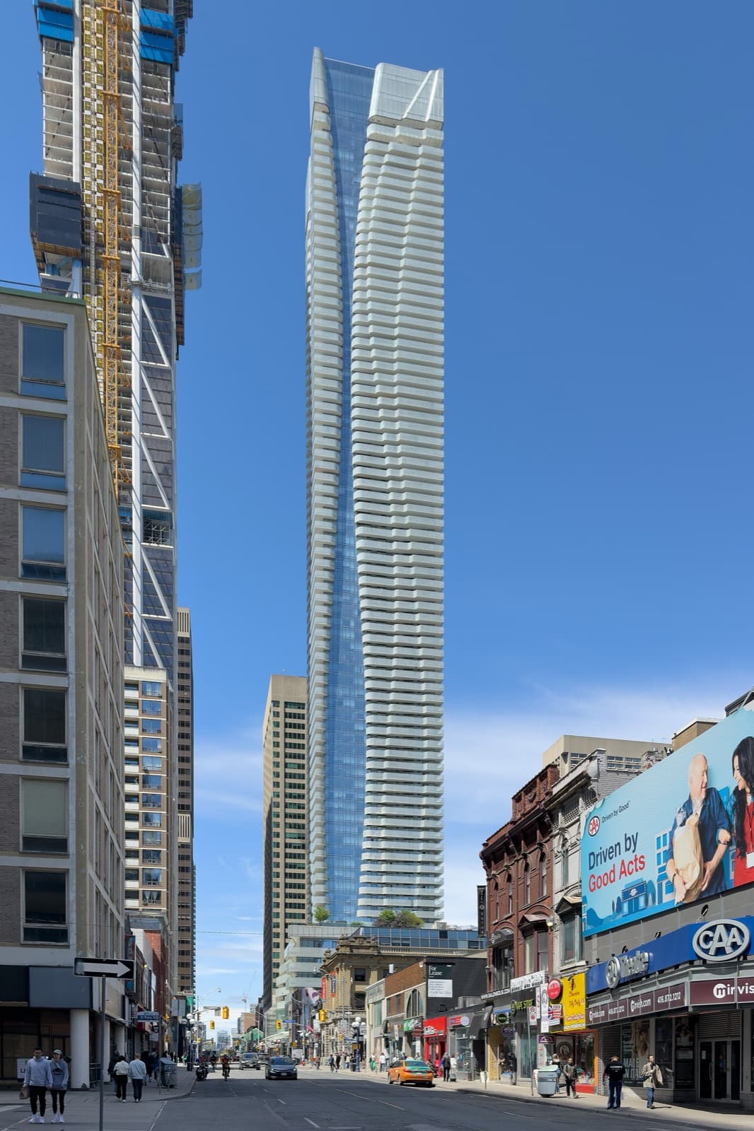 One Bloor's curved glass tower at Yonge and Bloor in Toronto