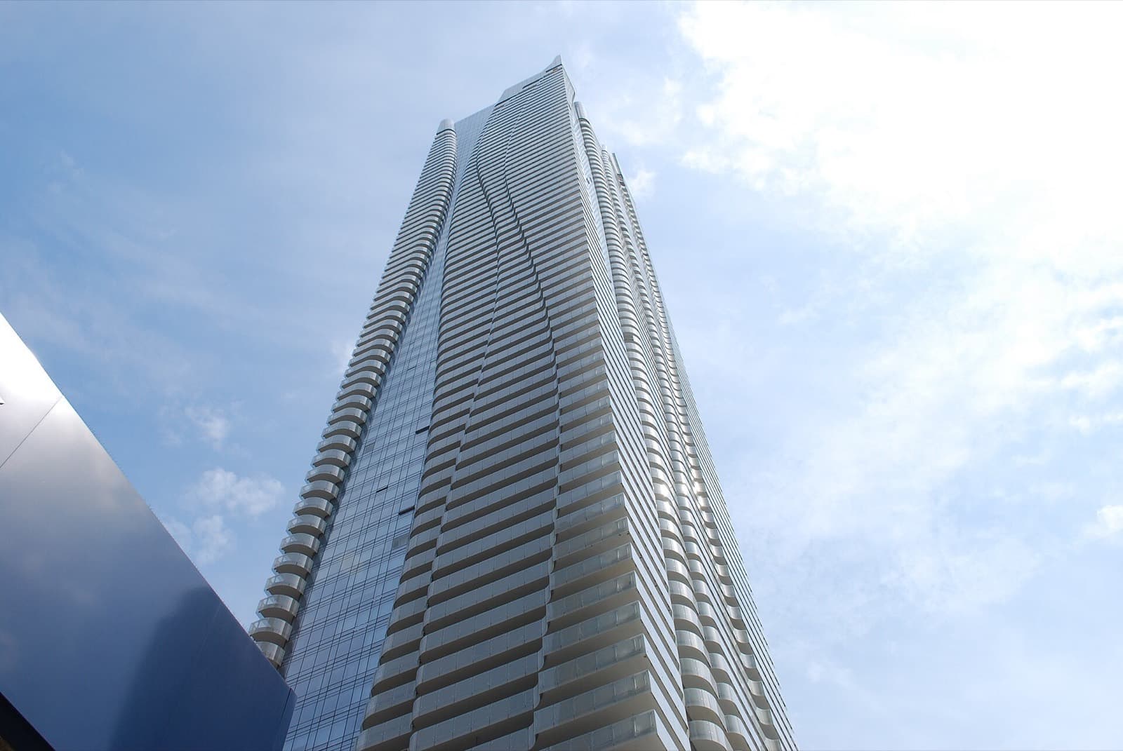 One Bloor's wave-like balconies above the Yonge and Bloor intersection