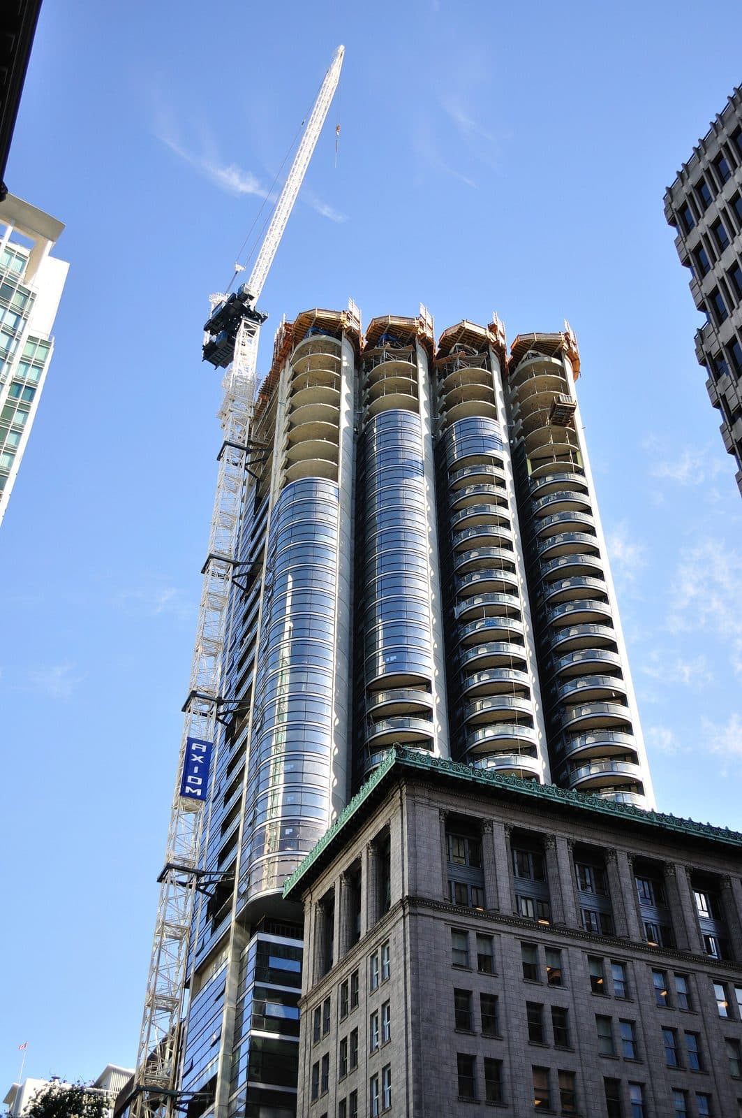 Jameson House near completion with a construction crane beside it