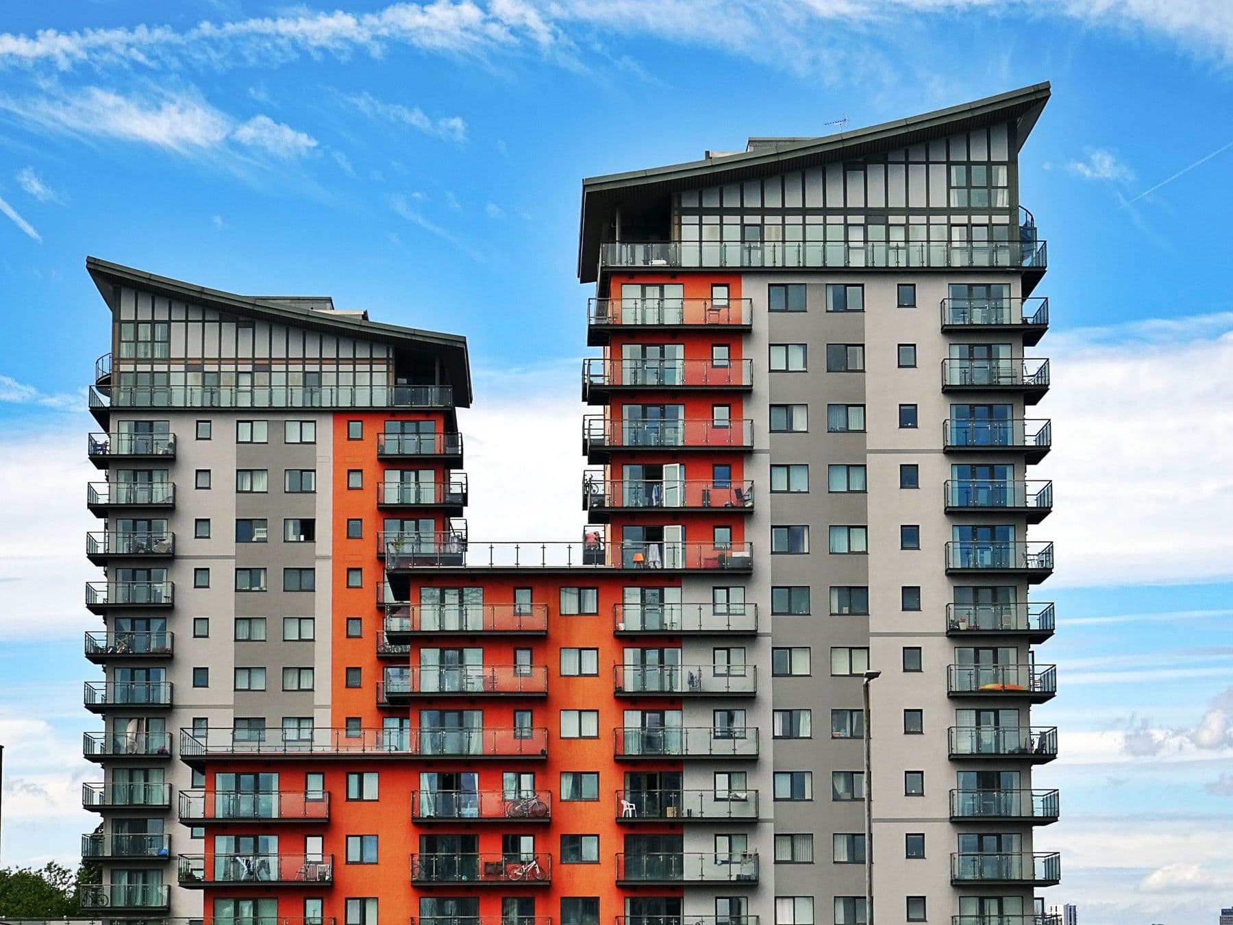 Modern apartment buildings with glass balconies