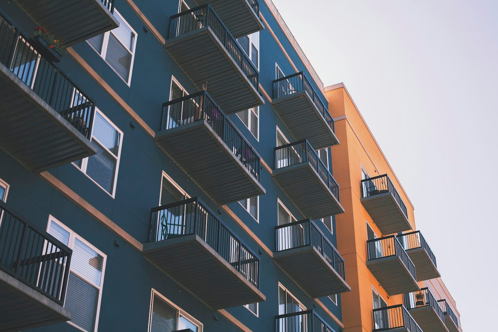 Modern apartment balconies on a two-tone residential building